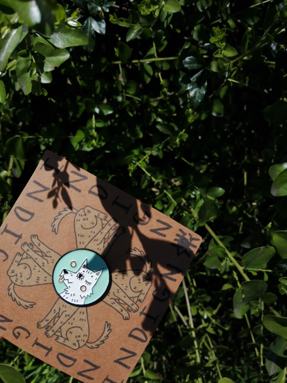 Prendedor metálico (pin)